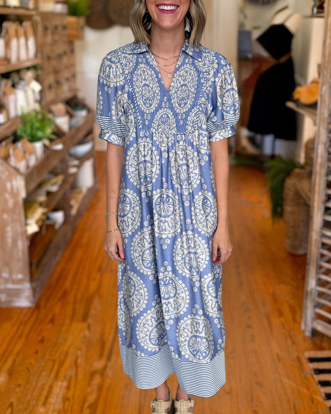 Blue paisley smocked midi dress front view