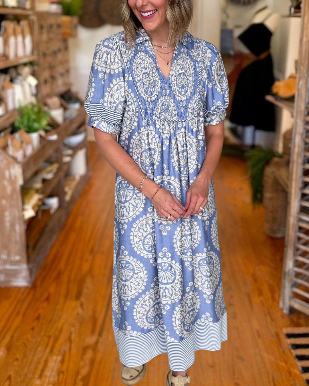 Blue paisley smocked midi dress front detail view