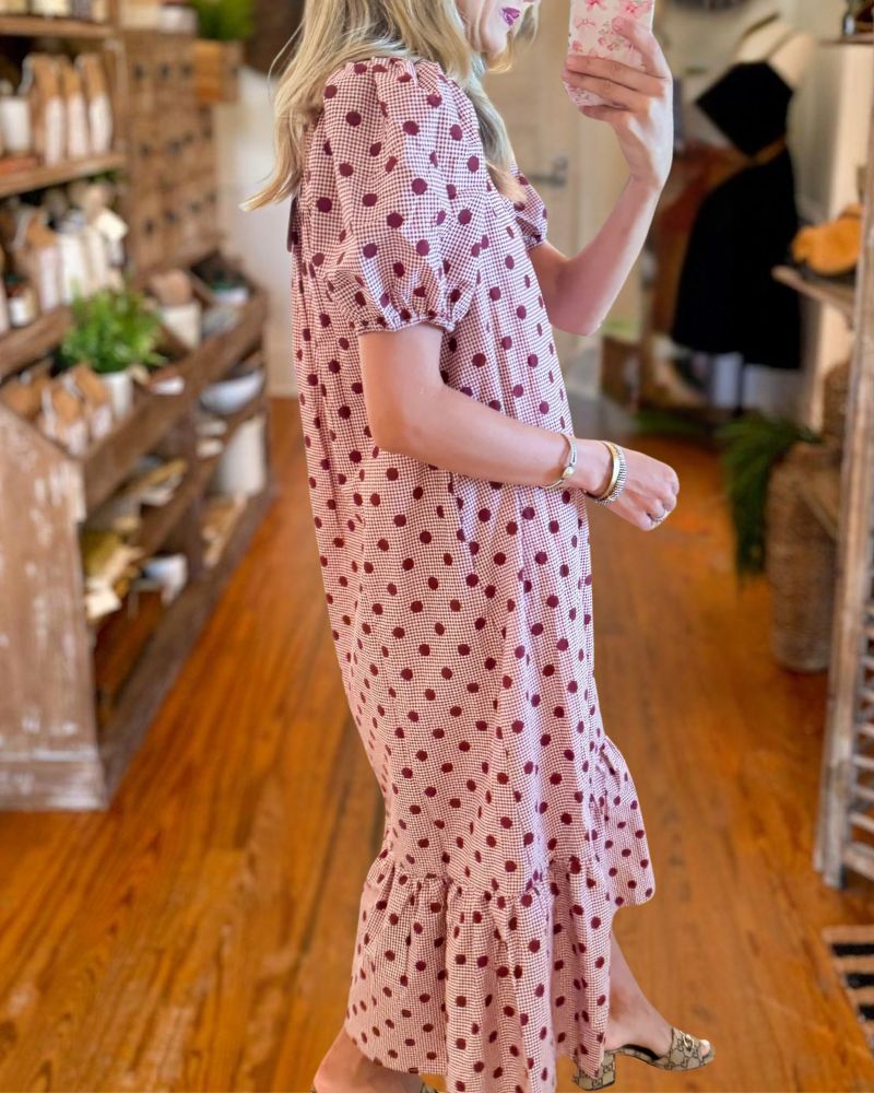 Pink polka dot puff sleeve midi dress side view